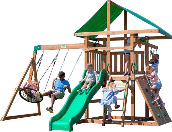 A complete set of wooden mountain-style swings, equipped with a colorful canvas sunshade, a wave slide, a rope swing, a net swing, and a rock wall with climbing ropes and ladders. P9318